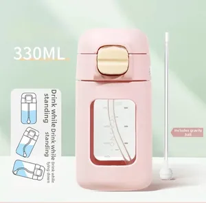 Pink 330ml kids straw cup with gravity ball and measurement scale for easy drinking