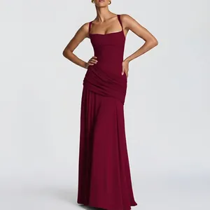 Elegant burgundy spaghetti strap maxi dress with pleated waist and A-line skirt flow