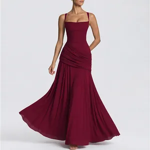 Detailed view of the dark red pleated maxi dress featuring a square neck and waist folds