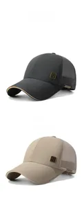 Close-up of mesh baseball cap side with bronze metal plate and sport label detail