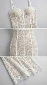 Detailed view of floral lace pattern with corset bodice and sheer eyelash lace hem