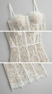 Detail view of white floral lace bodice with eyelash trim and corset structure