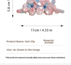 Détails de la pince à cheveux fleur en acétate rose et bleu avec strass central