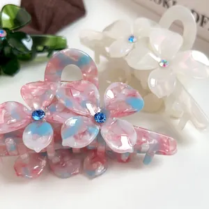Pinces à cheveux fleurs en acétate avec strass en couleurs bleu, blanc et vert