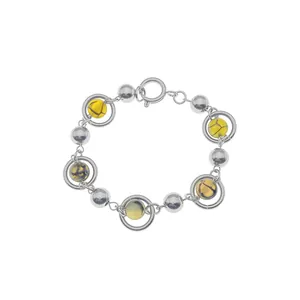 Detail of silver beaded chain with yellow cat eye stone inlays and spring clasp