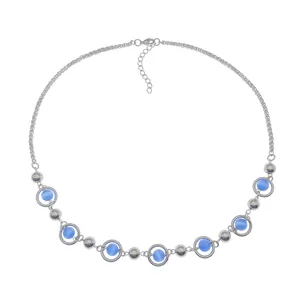 Detail of silver necklace with blue cat eye stone beads and lobster clasp closure