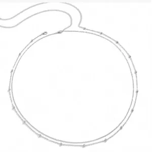 Detail of silver double-layer bead chain body jewelry with lobster clasp closure