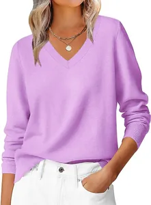Close-up of ribbed V-neckline and soft lavender knit texture on women's sweater