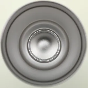 Overhead macro view of a 30oz stainless steel vacuum tumbler showing the smooth inner metal base