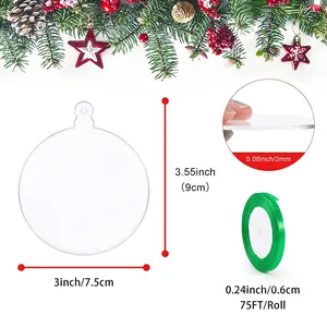 Clear acrylic Christmas ornament discs with green ribbon for holiday DIY crafts