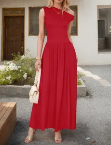 Detailed view of red asymmetrical off-shoulder maxi dress with a flowing skirt