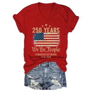 Red V-neck t-shirt with USA 250th anniversary print and denim shorts on white background