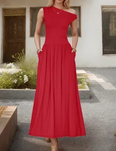 Detail of elegant red one-shoulder sleeveless maxi dress with pockets and flowy hemline