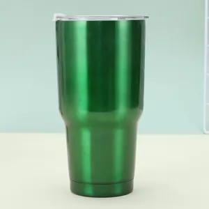 Macro view of 30oz green stainless steel tumbler featuring double-wall vacuum insulation