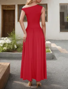Elegant back view of red one-shoulder maxi dress with a large flowing skirt in a courtyard