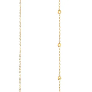 Elegant gold double layered beaded waist chain with polished gold spheres on slim links