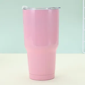 Detail of a matte pink 30oz stainless steel tumbler showing lid and tapered base