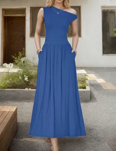 Detail view of the royal blue one-shoulder maxi dress showing soft fabric texture