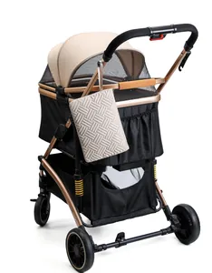 Detail of pet stroller showing a woven beige hanging bag on the bronze metal frame