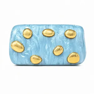 Blue marble acrylic clutch bag with golden pebble accents for women's evening parties