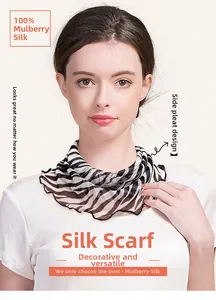 Detail of 100% mulberry silk neck scarf featuring zebra pattern and side pleats