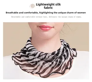 Detailed view of sheer mulberry silk neck gaiter with elegant zebra pattern design