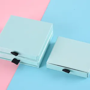 Elegant drawer gift box in tiffany blue with black ribbon handle and matte finish