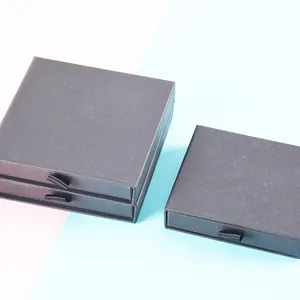 Matte black drawer jewelry boxes with ribbon pull tabs in square and rectangular sizes