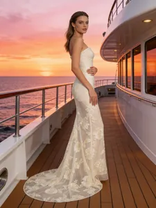 Elegant ivory strapless fishtail evening gown with 3D floral embroidery and sweep train