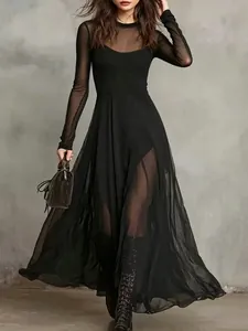 Elegant black mesh patchwork long sleeve dress with full skirt and transparent details