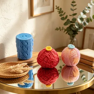 Knitted yarn candle mold ball set for DIY cake baking and home decor on gold table