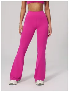 Close-up of high-waist yoga flared leggings in rose pink stretchy fabric