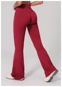 Detail of high waist yoga pants showing peach butt seam and flared dark red hem