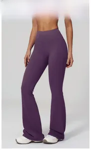 Detail of high waist deep purple flare yoga pants with slimming side seam stitching