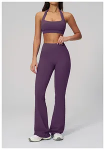 Detailed view of dark purple high-waisted flared yoga pants and halter sports bra set