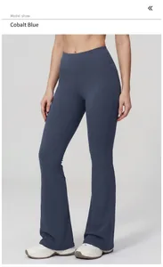 Detail of high waisted yoga flare pants in cobalt blue with seamless elastic fabric