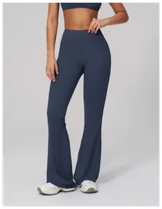 Front view of high waisted navy blue flare yoga pants and matching sports bra set