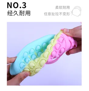 Close-up of flexible rainbow silicone heart bag showing its durable and stretchy texture