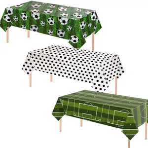 Three-piece soccer theme party tablecloth set featuring green grass and football patterns