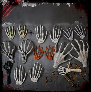 Halloween plastic skeleton hand props in various colors including ivory and blood red