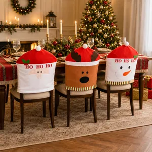 Three-piece Christmas chair cover set with Santa, elk, and snowman motifs in red fabric