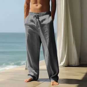 Close-up of gray cotton linen pants texture with drawstring waist and beach resort style