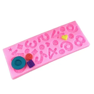 Pink silicone DIY mold for numbers and shapes with colorful fondant cake samples