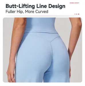 Close-up of high-waisted yoga pants with V-shaped seam detail and blue elastic fabric