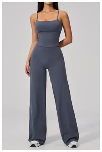 Detailed view of high-waist wide-leg sports pants with matching camisole in grey-blue
