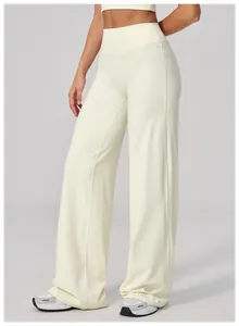 Close-up of high-waisted wide-leg yoga pants with vertical decorative stitching