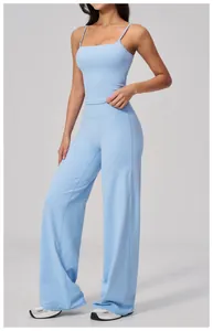 Close-up of high-waist light blue wide-leg sports trousers with premium elastic fabric