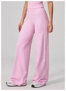 Detail of high waist light pink wide leg sports pants with premium breathable fabric
