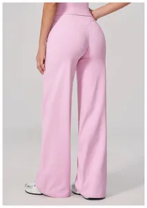 Detail of high waist yoga pants in pink with V-shaped back seam and seamless fabric