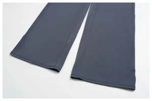Detail view of double-needle stitching on high-waist split flare sports pants